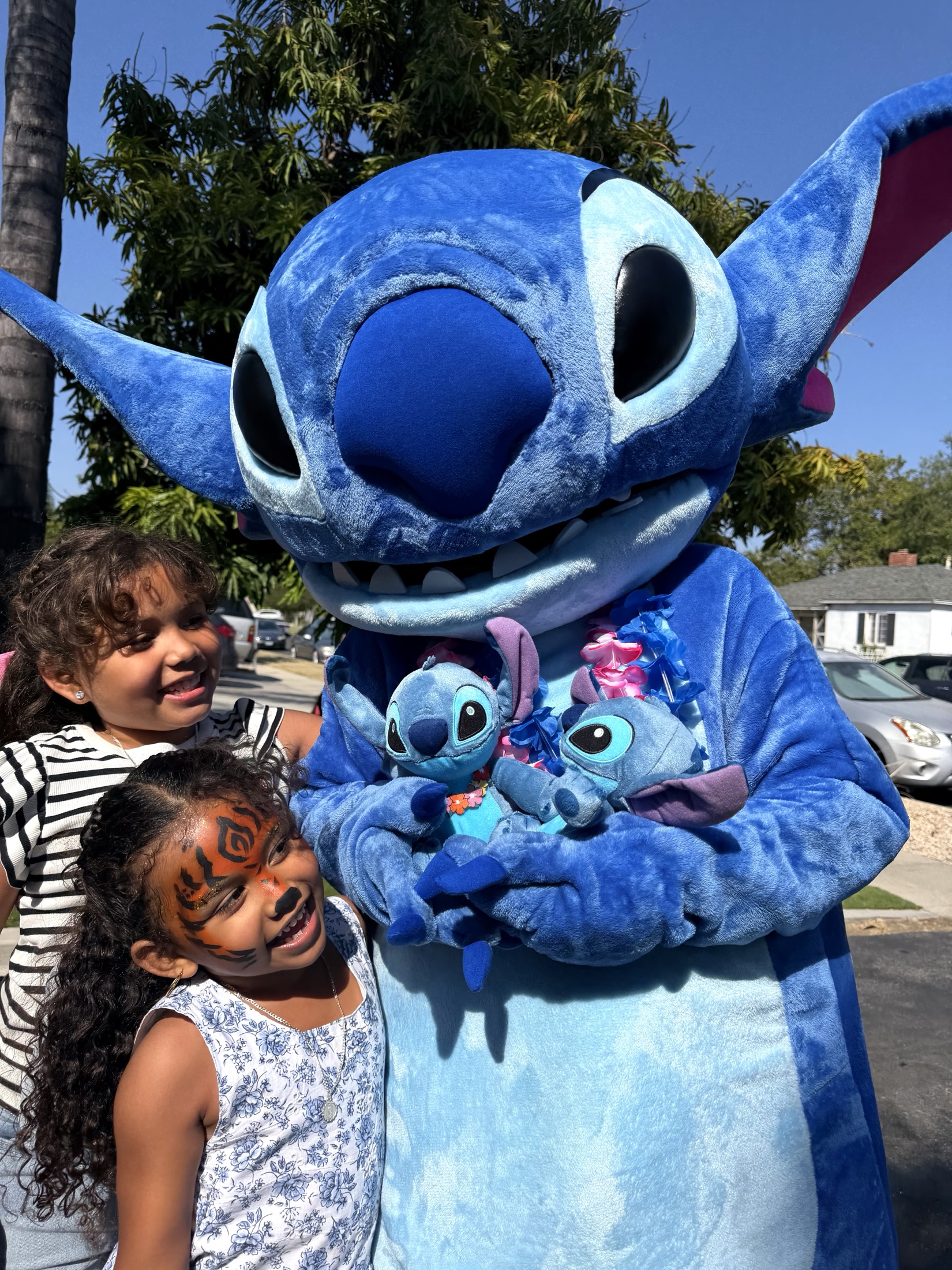Mascot character greeting children