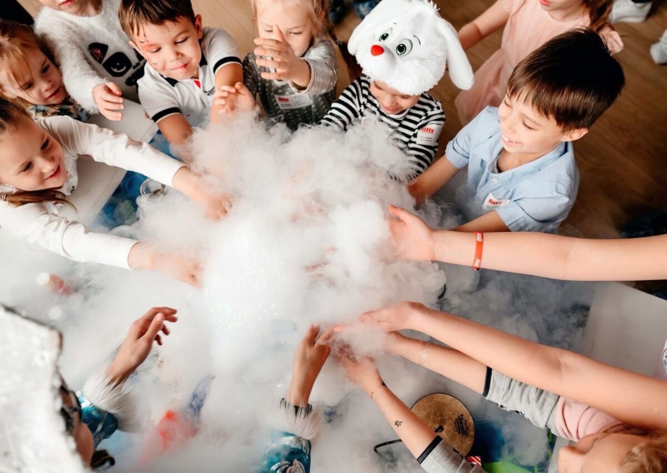 Children taking part in a science show